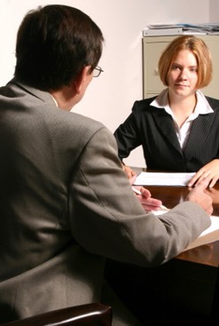 Young woman conducting job interview